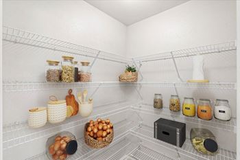 A pantry with shelves filled with jars and baskets